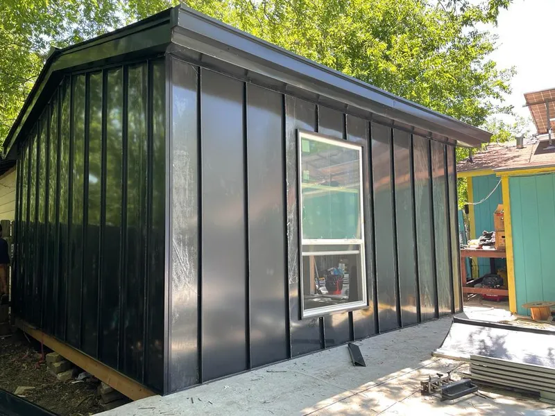 Black standing seam metal wall panels for Metal Roof Installation in Midvale